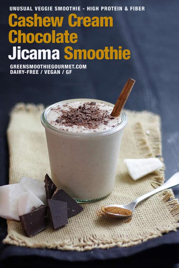 A cup of cashew cream chocolate jicama smoothie on a burlap cloth with chunks of jicama nearby.