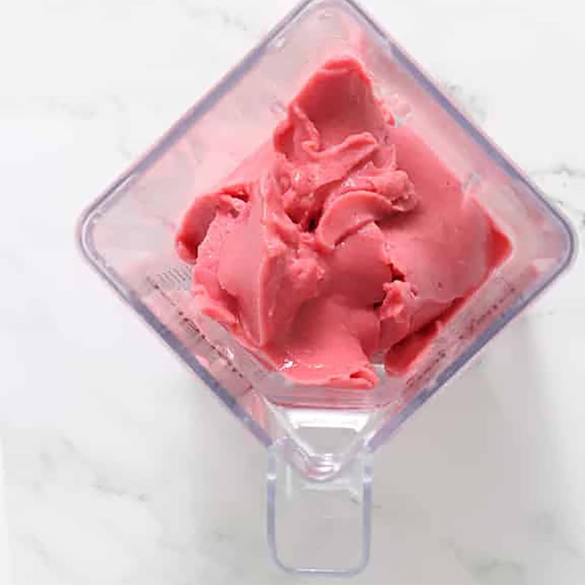 blended watermelon ice cream with raspberries.