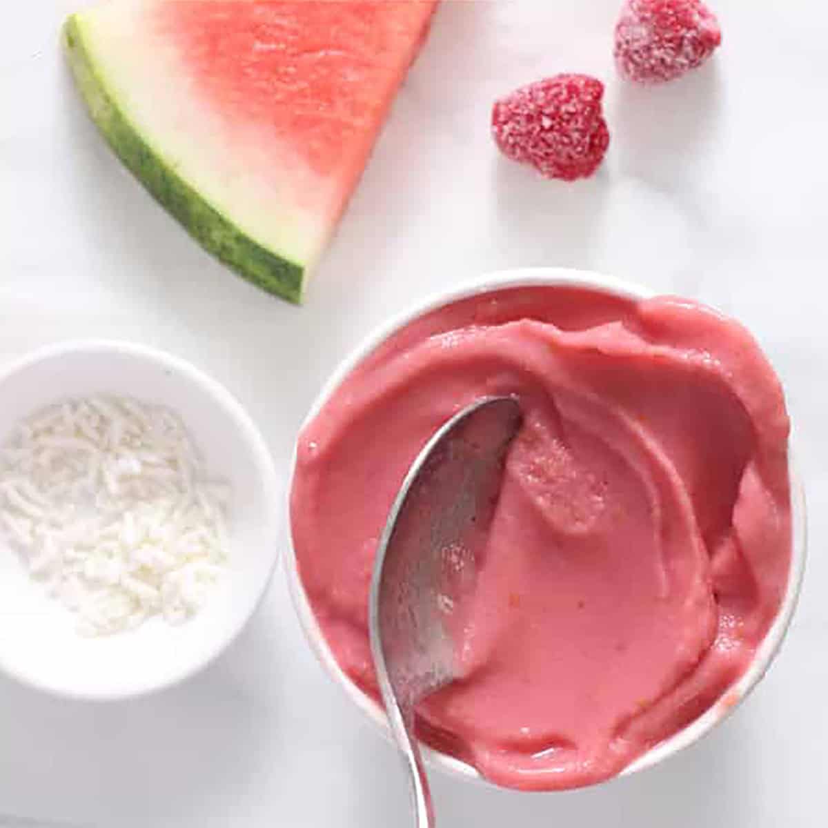 blended watermelon ice cream with raspberries.