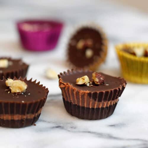 hazelnut truffles on a marble board