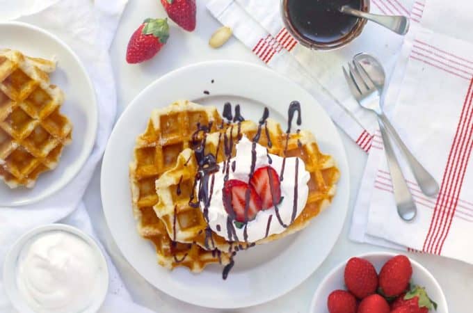 Overhead view of Simple Weight-Loss Aquafaba Blender Waffles on a white dish.