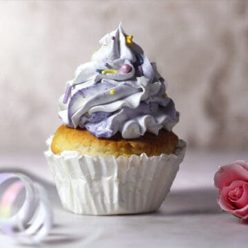 whipped cashew cream on a cupcake.