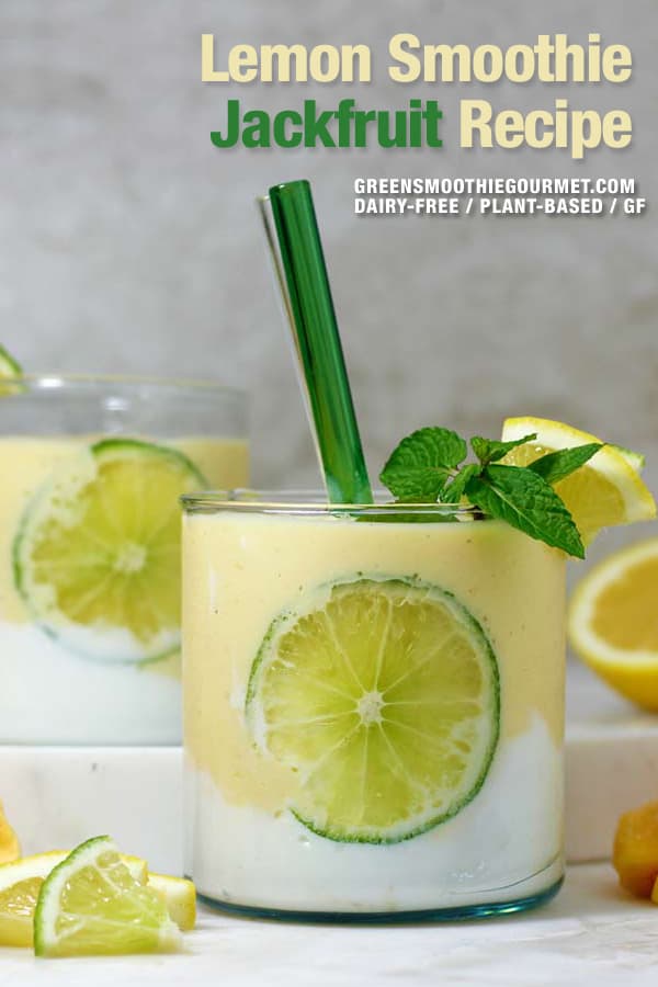 Lemon Smoothie Jackfruit in a glass with a lime slice inside the glass and lemon slices on table.