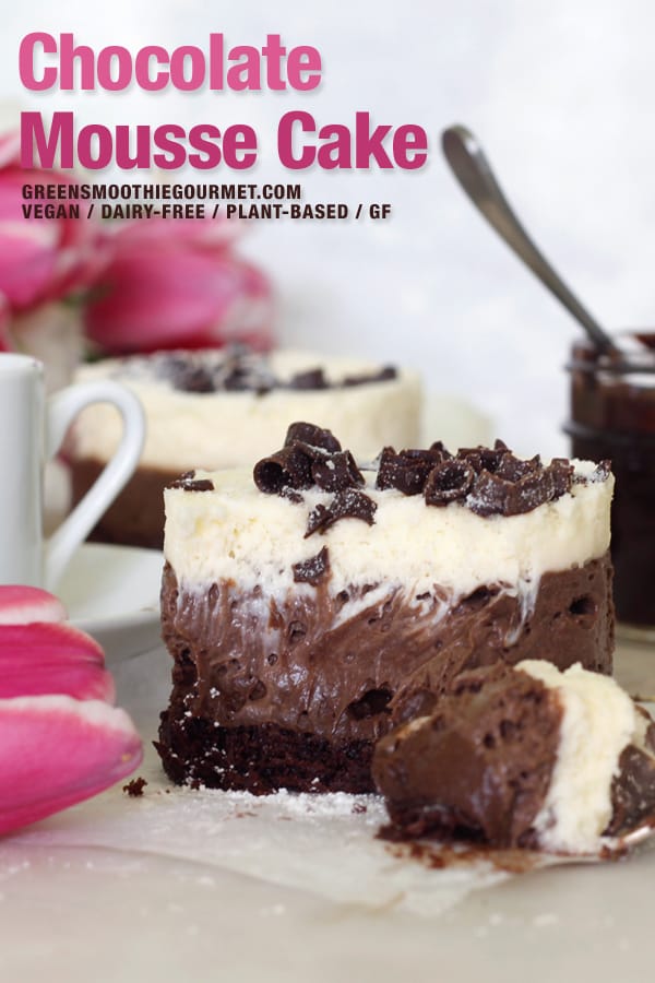 Three layered chocolate mousse cake with a chocolate pot in background.