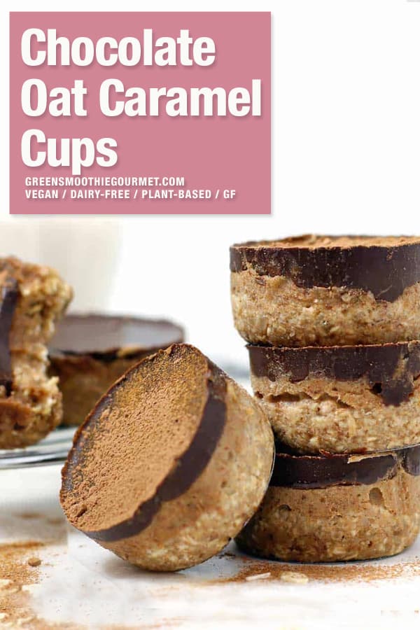 Towers of chocolate oat caramel cups on a white board.