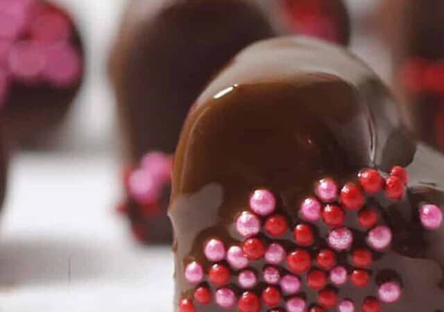 chocolate coated hearts with others behind it