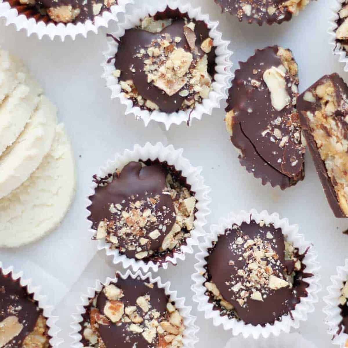 marzipan cups overhead view with sliced marzipan to the left