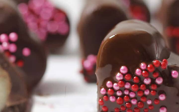 chocolate coated hearts with others behind it