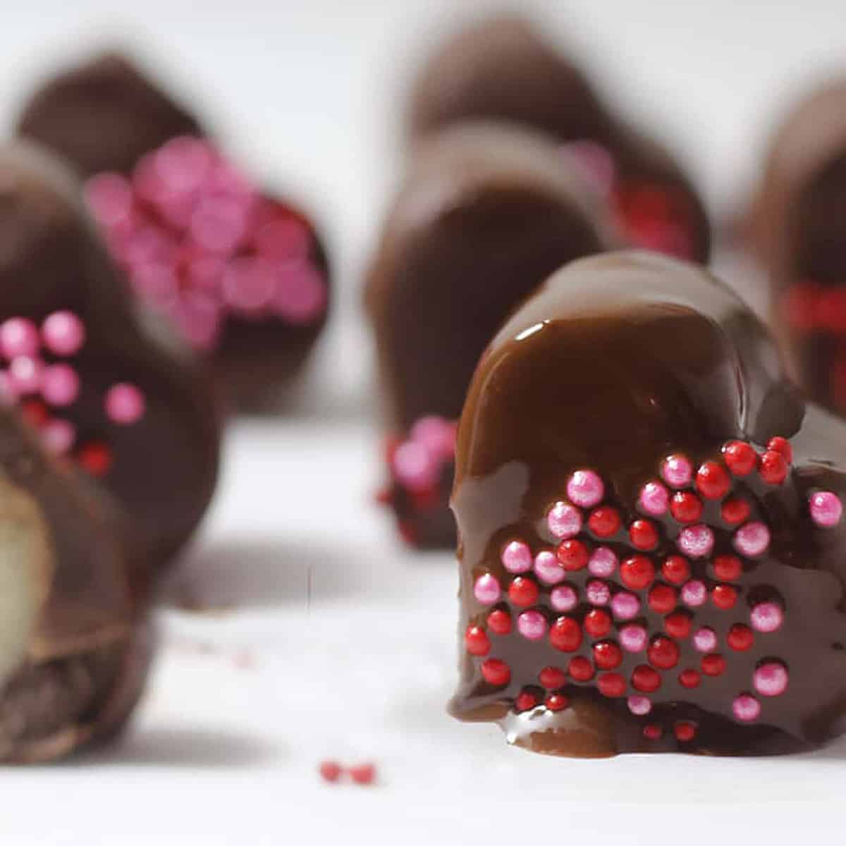 chocolate coated hearts with others behind it