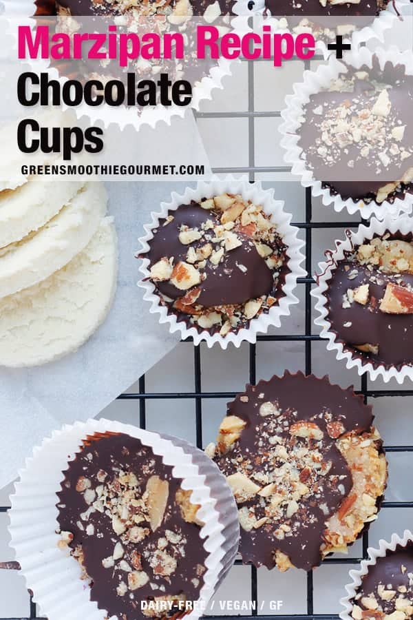 Chocolate cups stuffed with healthy vegan dairy-free marzipan and on a white board.