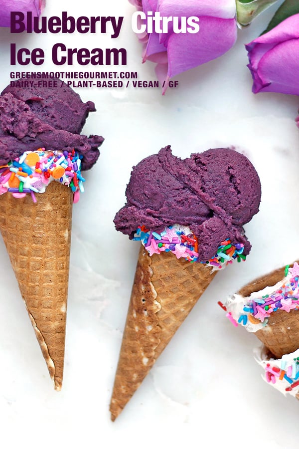 Blueberry ice cream in cones with empty cones on side.