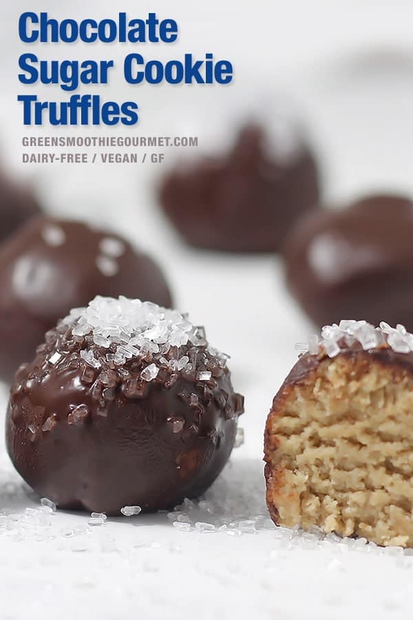 Chocolate Sugar Cookie Truffles on a white board with sugar crystals on top.