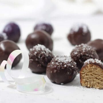 sugar cookie truffles in a row with sugar on top