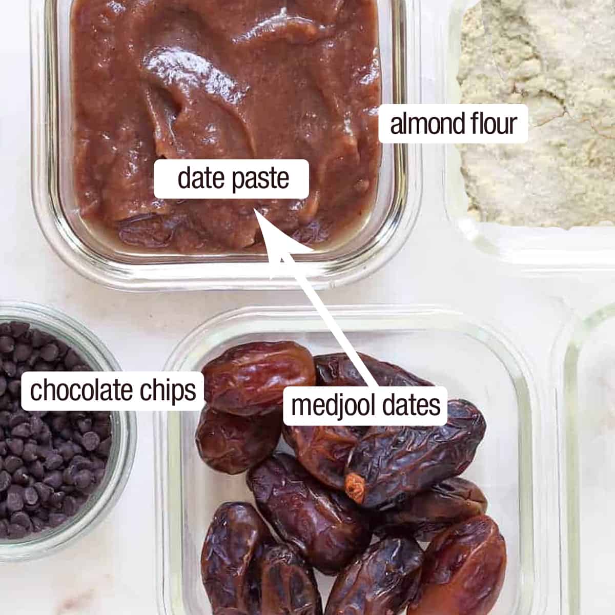ingredients for mars bars, open bowl of dates and almond flour