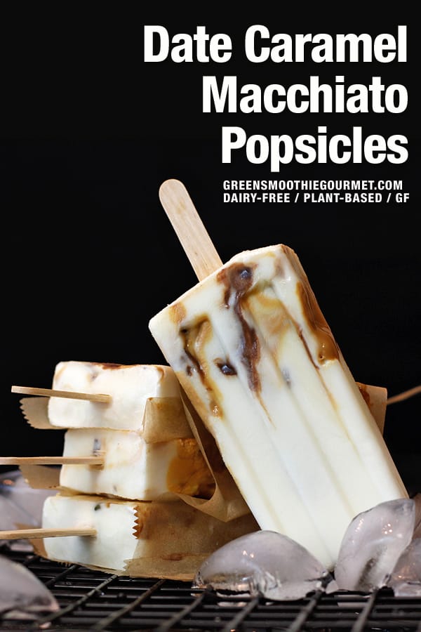Caramel Macchiato Popsicles with date caramel and nutella ripples on ice with a black background.
