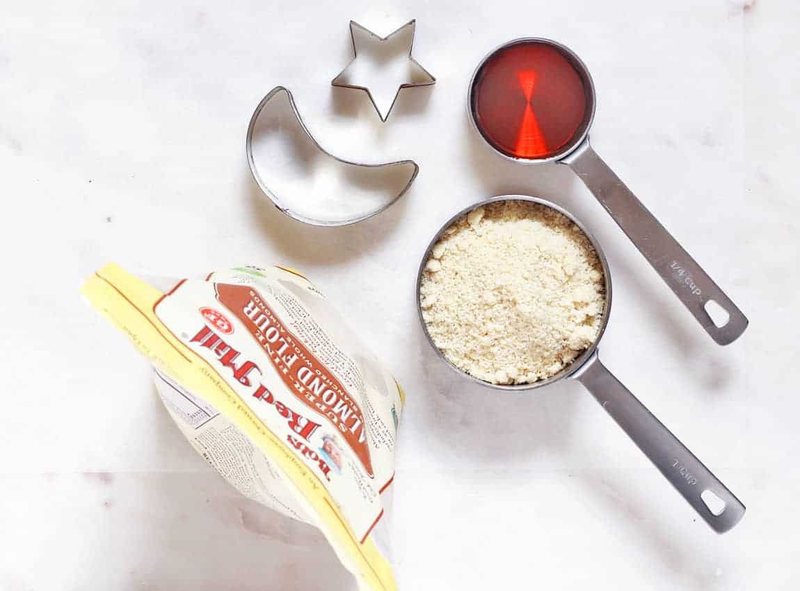Two ingredients in measuring cups for the 2-ingredient holiday sugar cookie recipe.