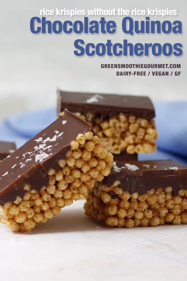 Chocolate Quinoa Scotcheroos piled on a white board with a blue napkin behind them.
