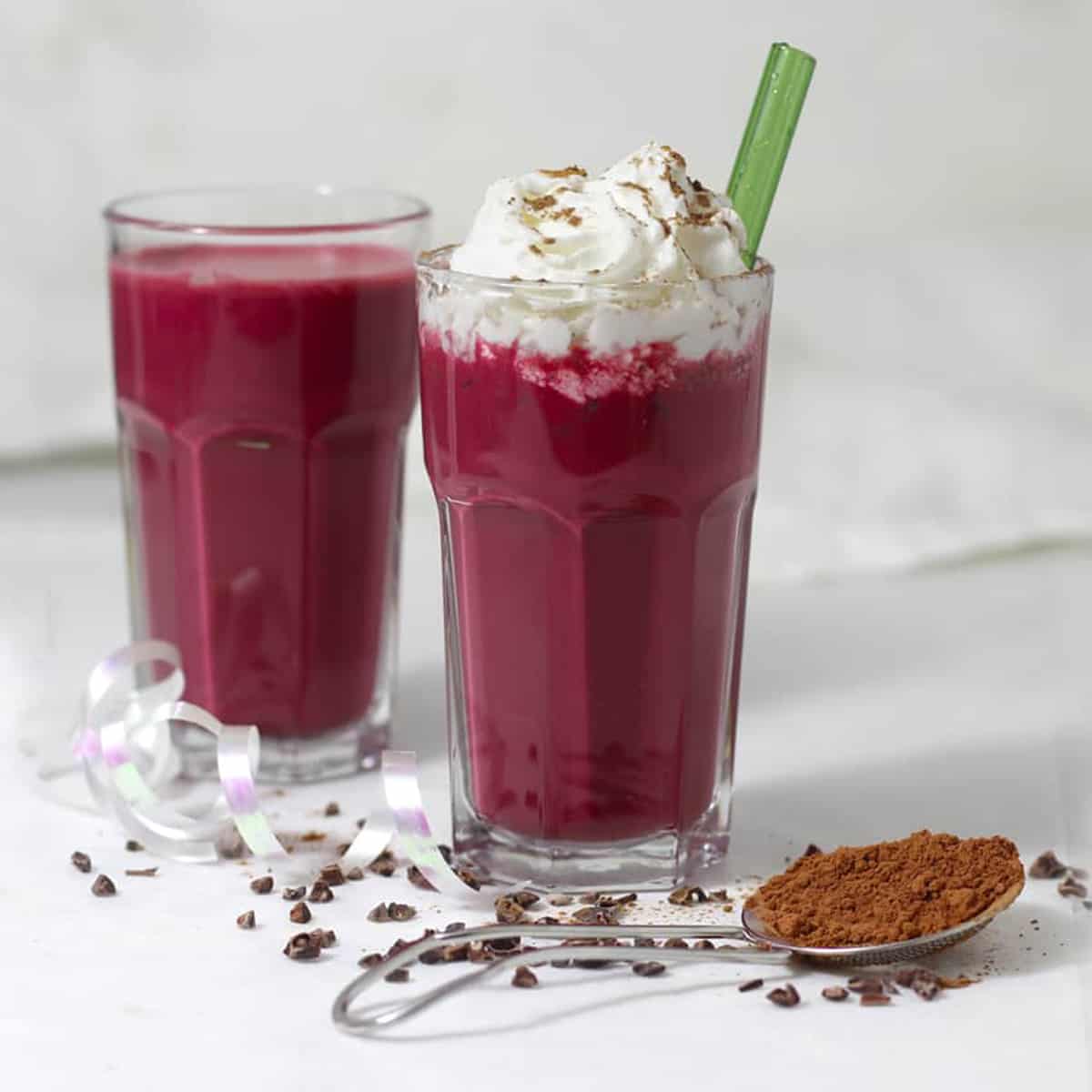 a glass of chocolate beet smoothies