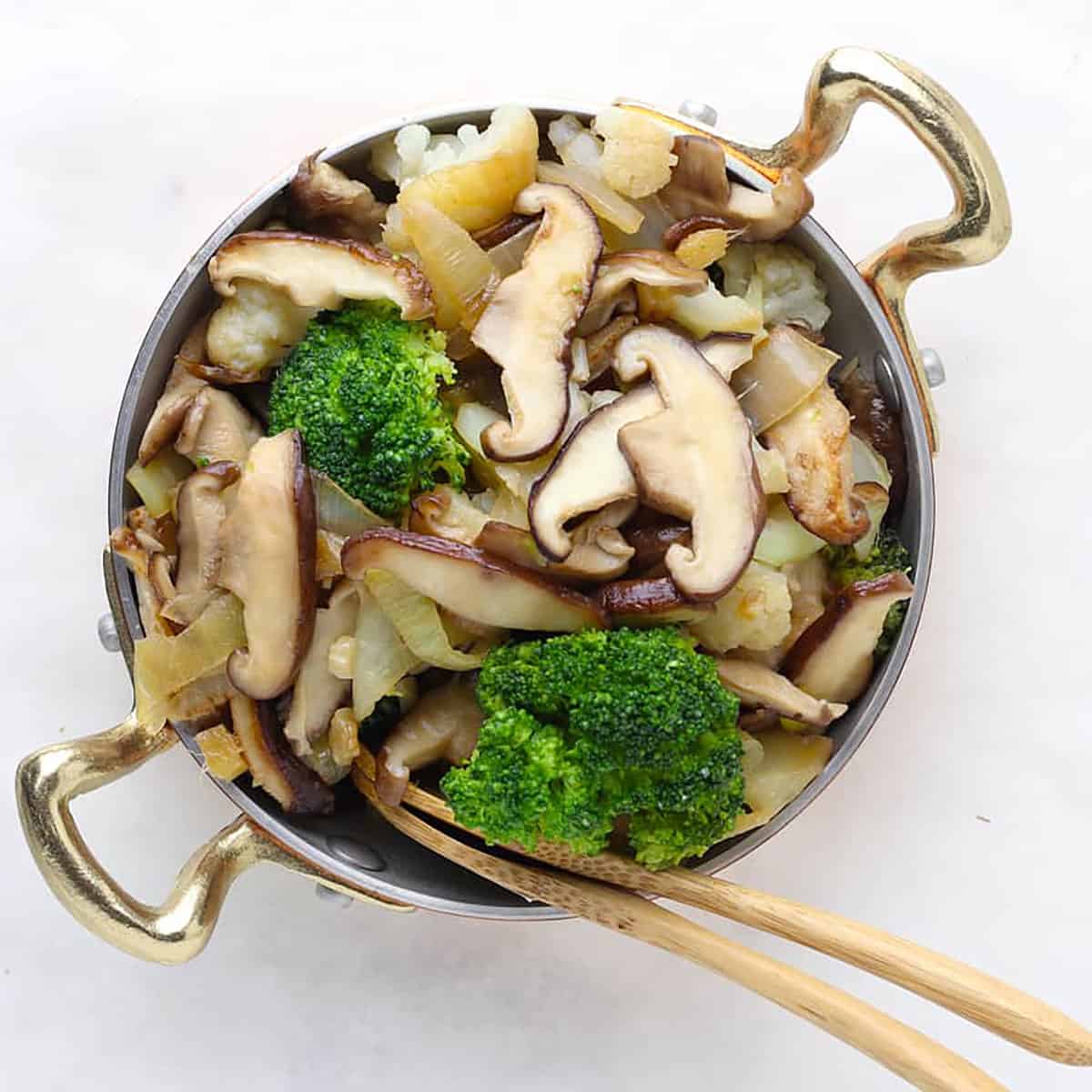 mushroom shiitake stir fry in a pan.