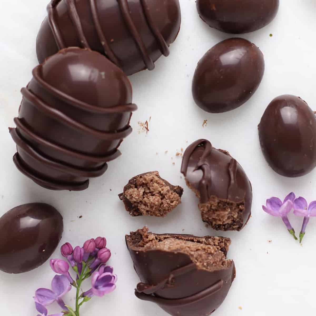 broken chocolate easter eggs with flowers