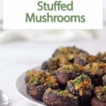 stuffed mushrooms in a platter in a stack.