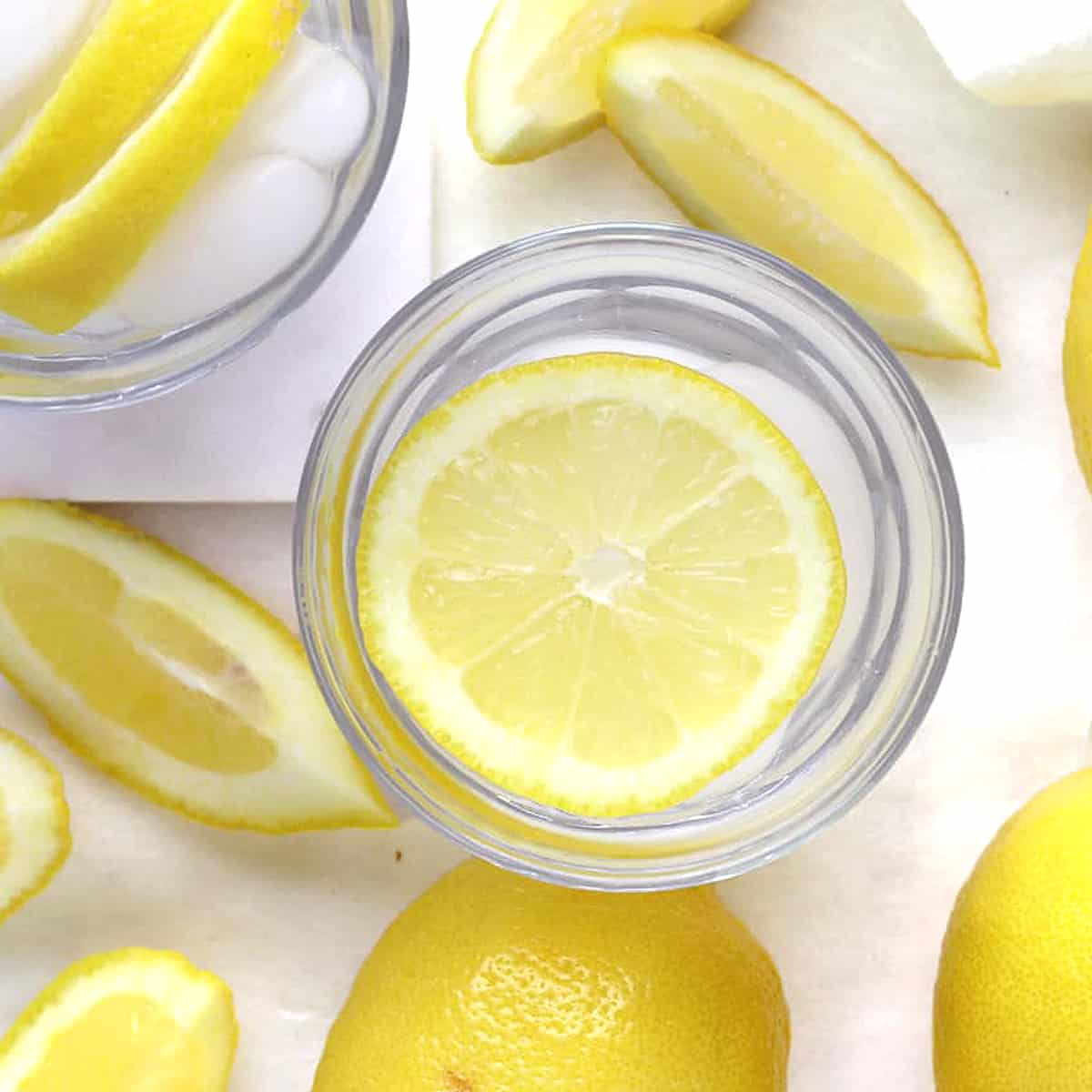 overhead of sliced lemon in a glass of water