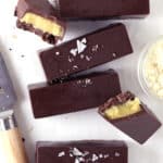 overhead of homemade twix bars with two broken