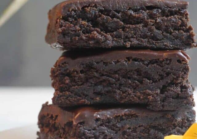 stack of brownies with a yellow flower