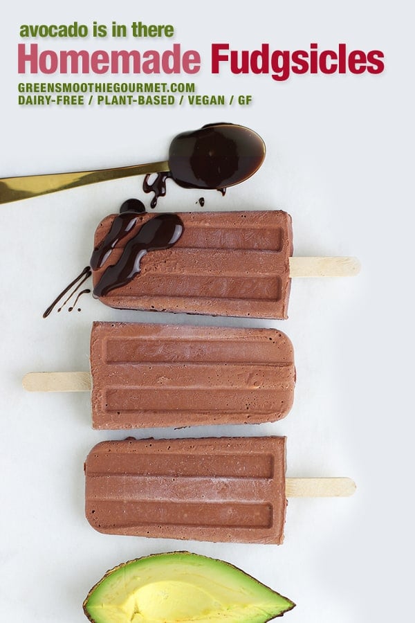A row of fudgsicles on a marble board.