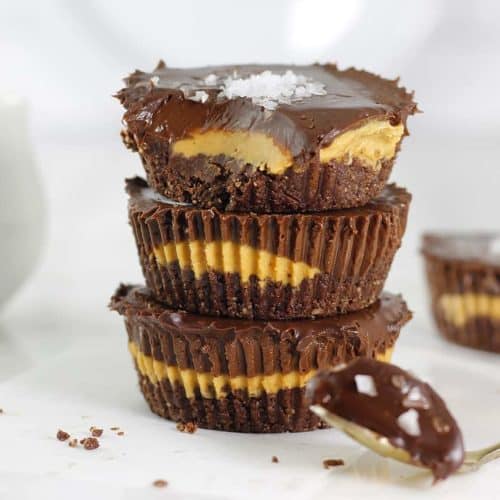 Peanut butter chocolate tarts in a tower.