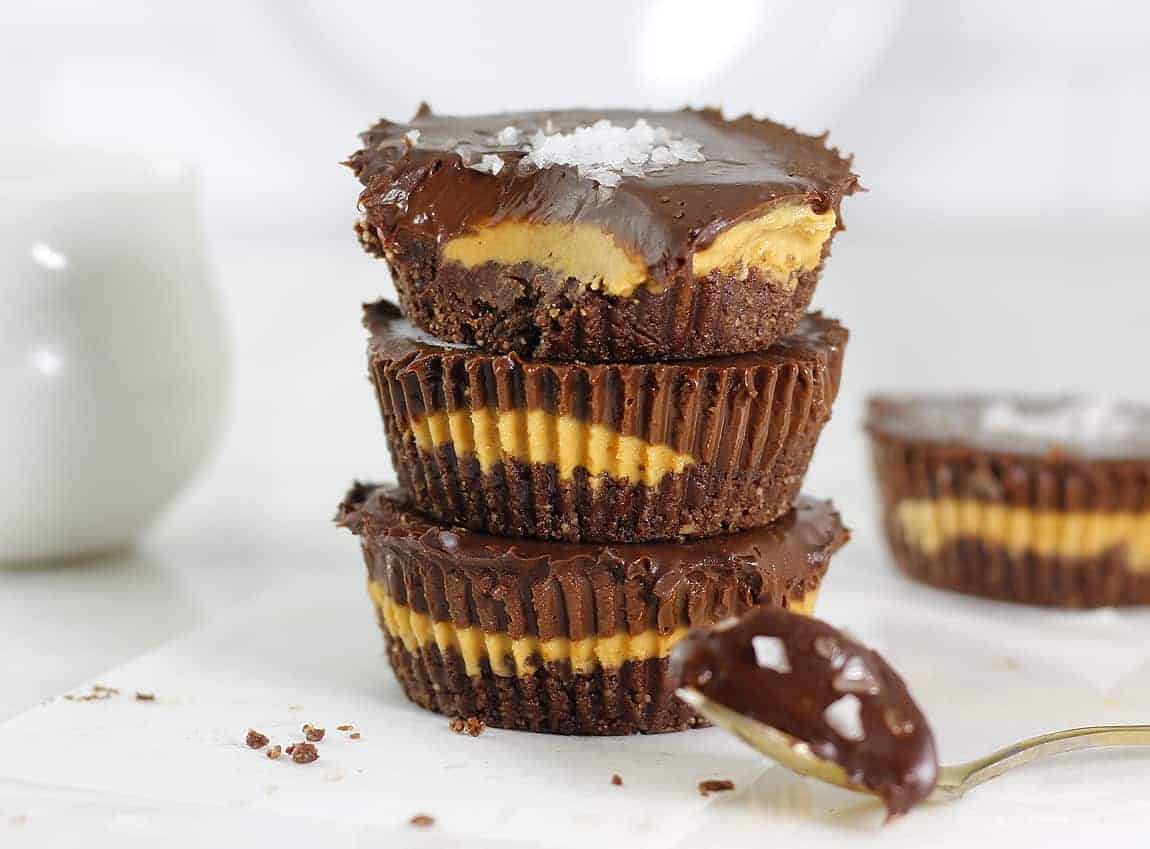 Peanut butter chocolate tarts in a tower.