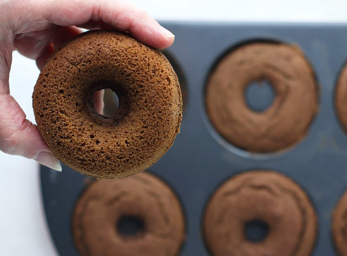 chocolate frosted donuts in pan..