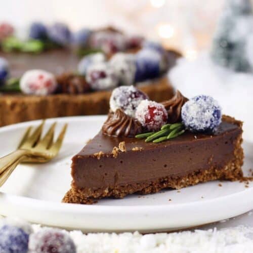 chocolate pie slice with sugared berries.