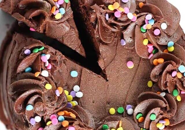 overhead of a cake frosted with chocolate fudge frosting.