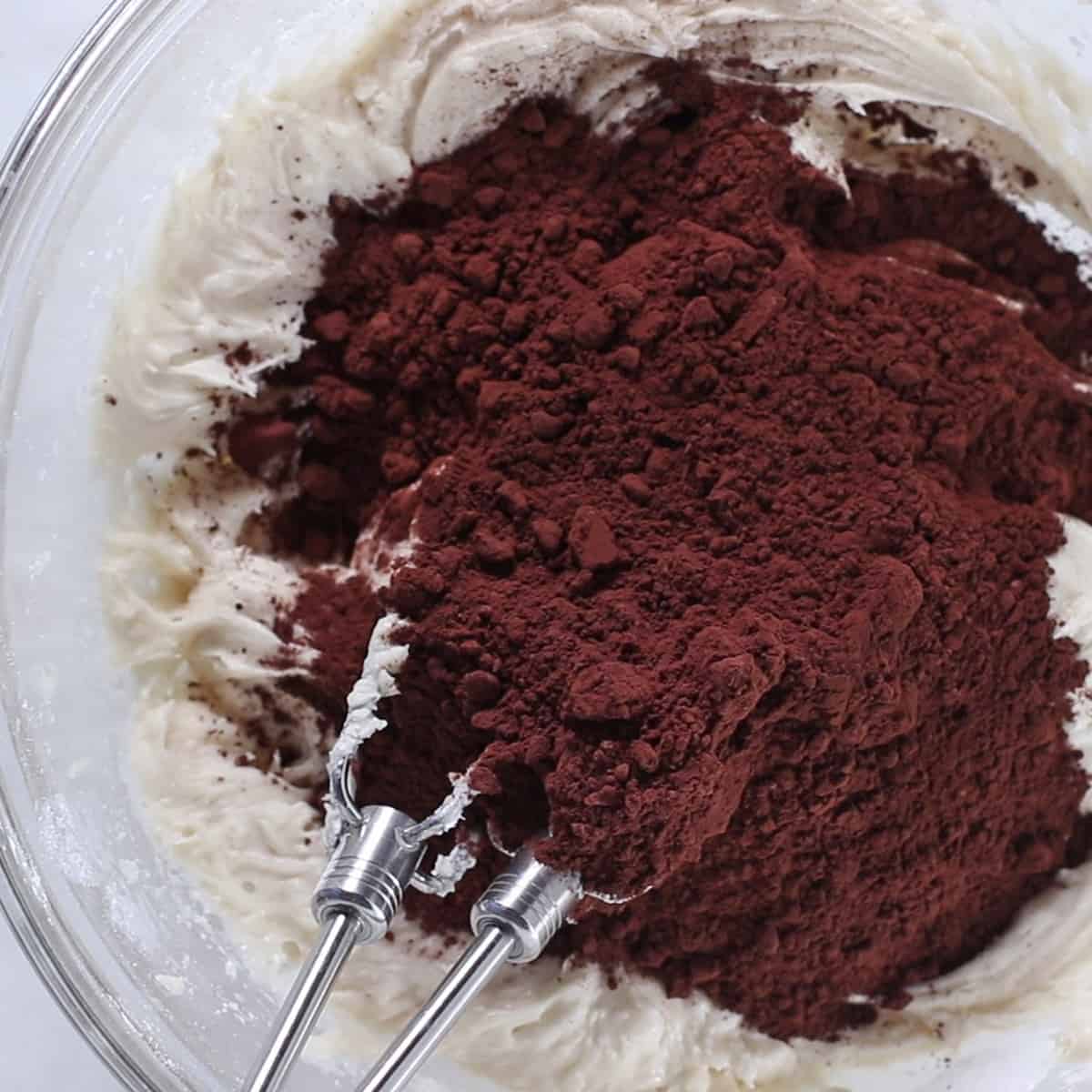 cocoa in with frosting to make fudge frosting.