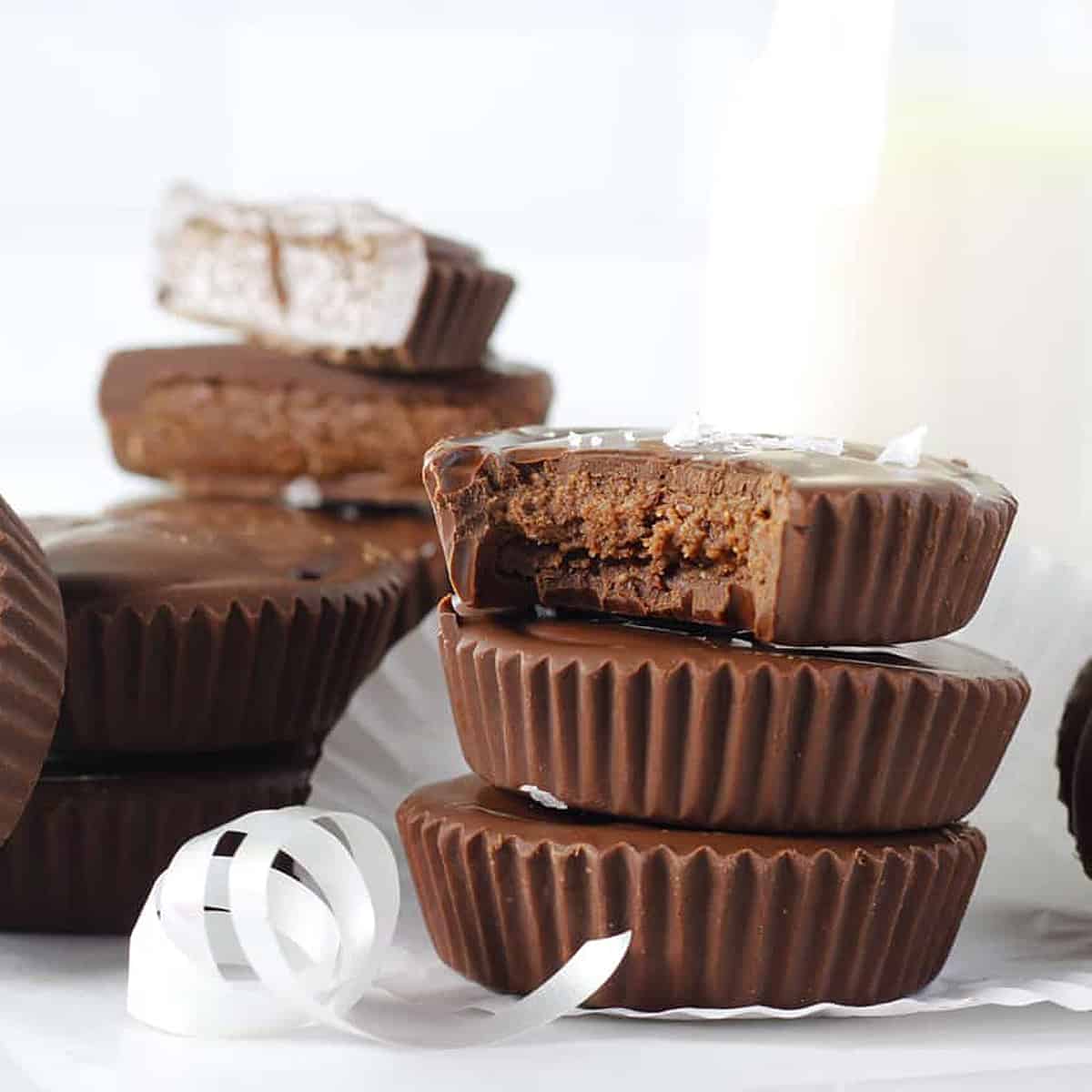 stack of three fudge cups with a white ribbon