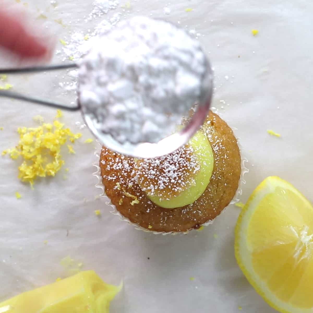 Dust cupcake with powdered sugar