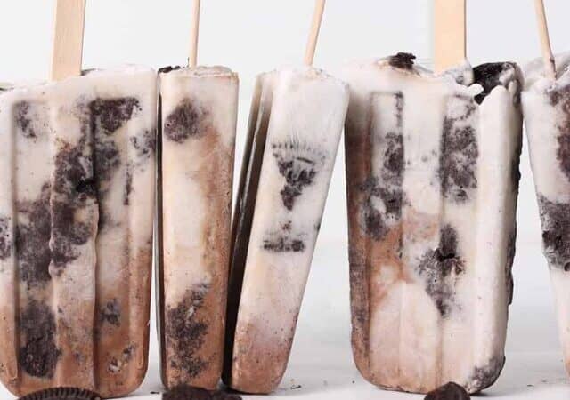 a row of cookies and cream popsicles