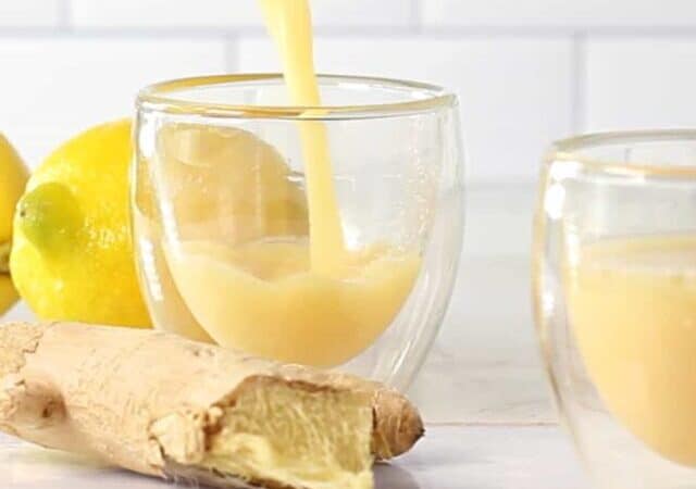 pour ginger shots into shot glasses