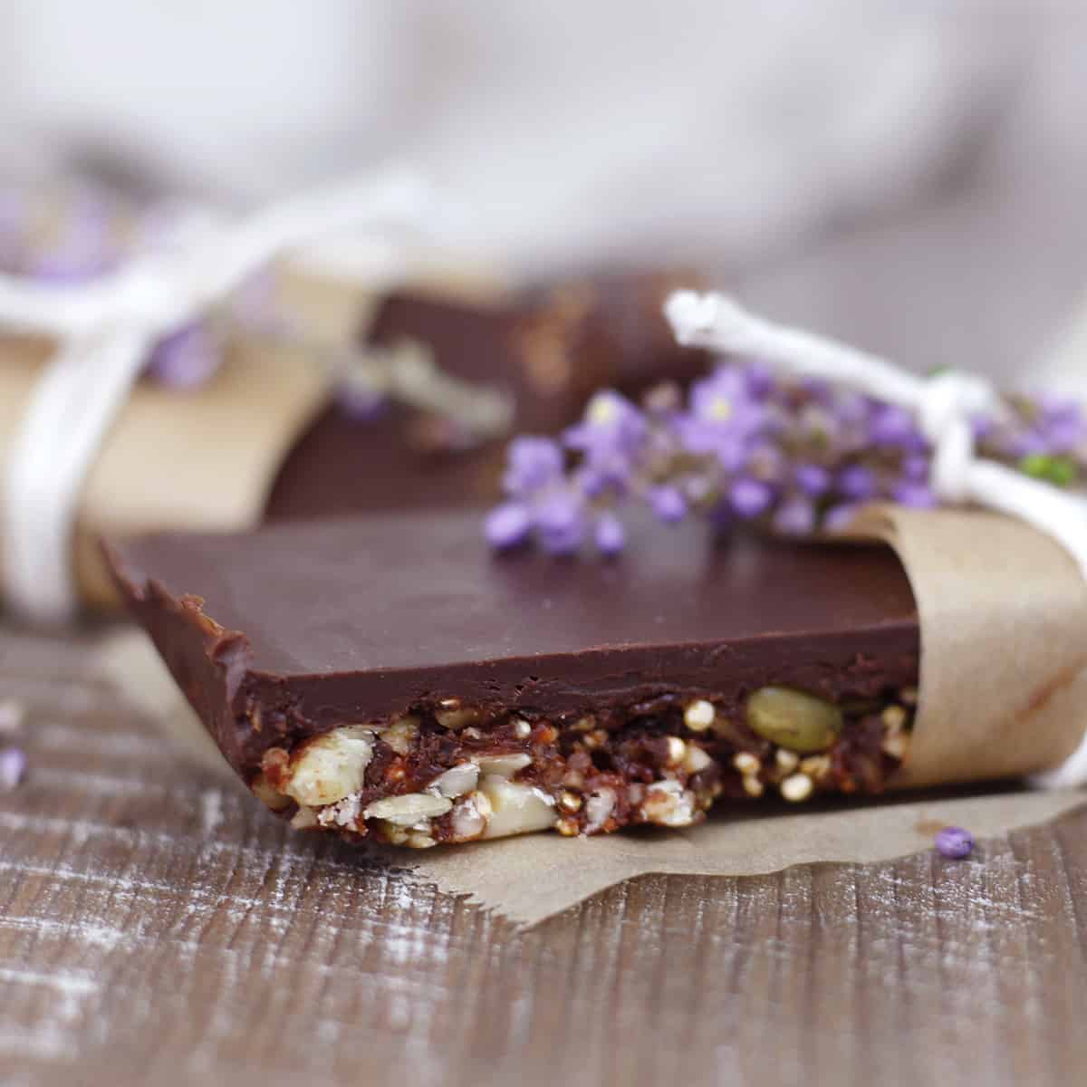 side view of a protein bar with a purple flower