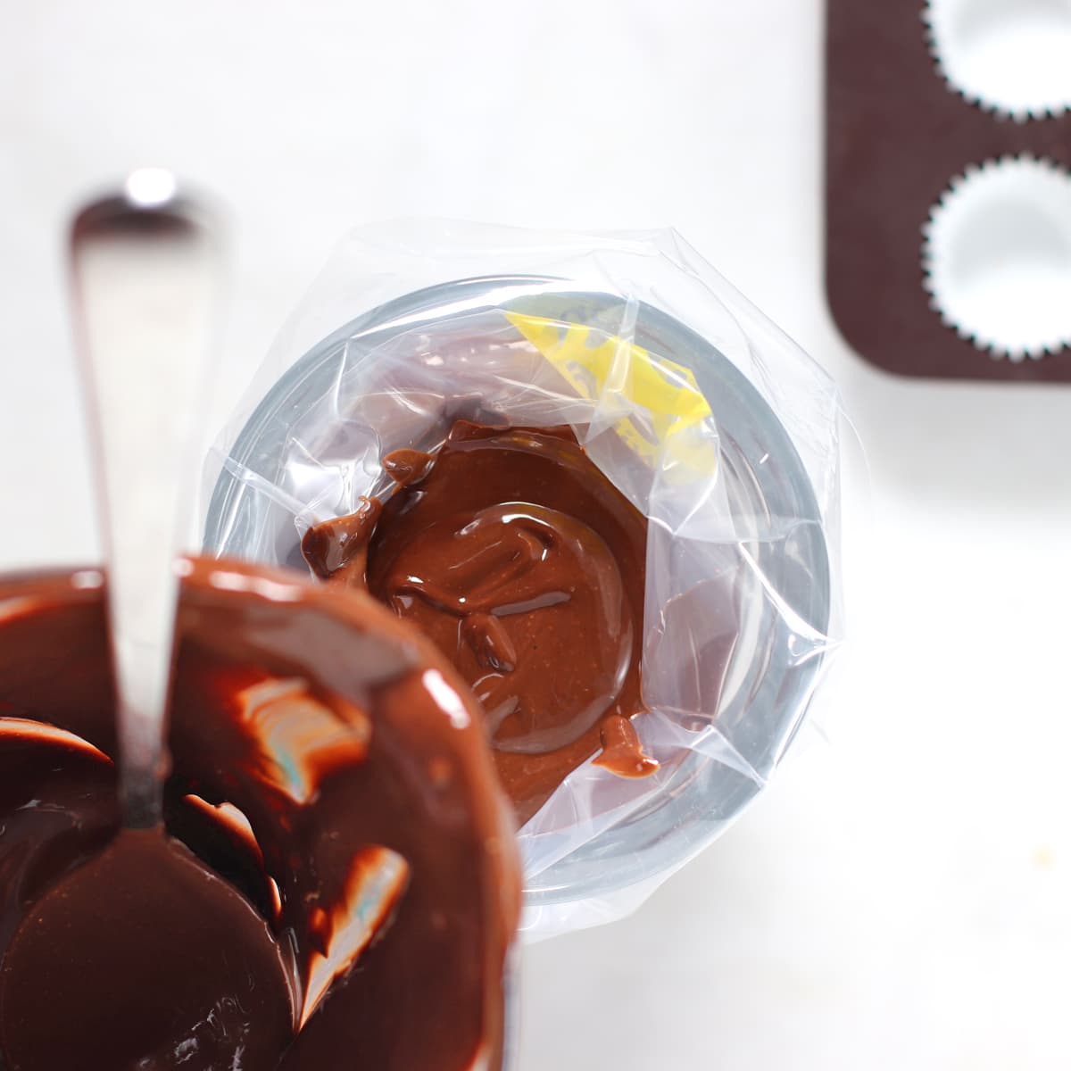 pouring fudge into a piping bag.