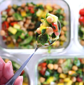 overhead of chickpea salad on a spoon