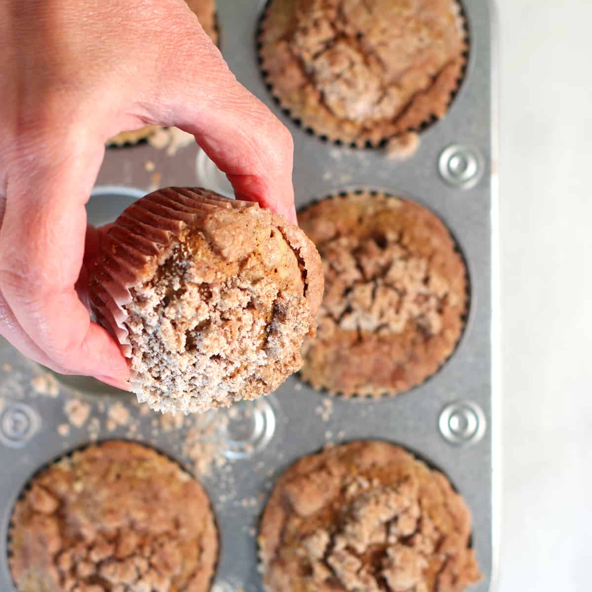 baked muffins with streusel on top.