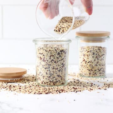 pouring puffed quinoa in to a jar