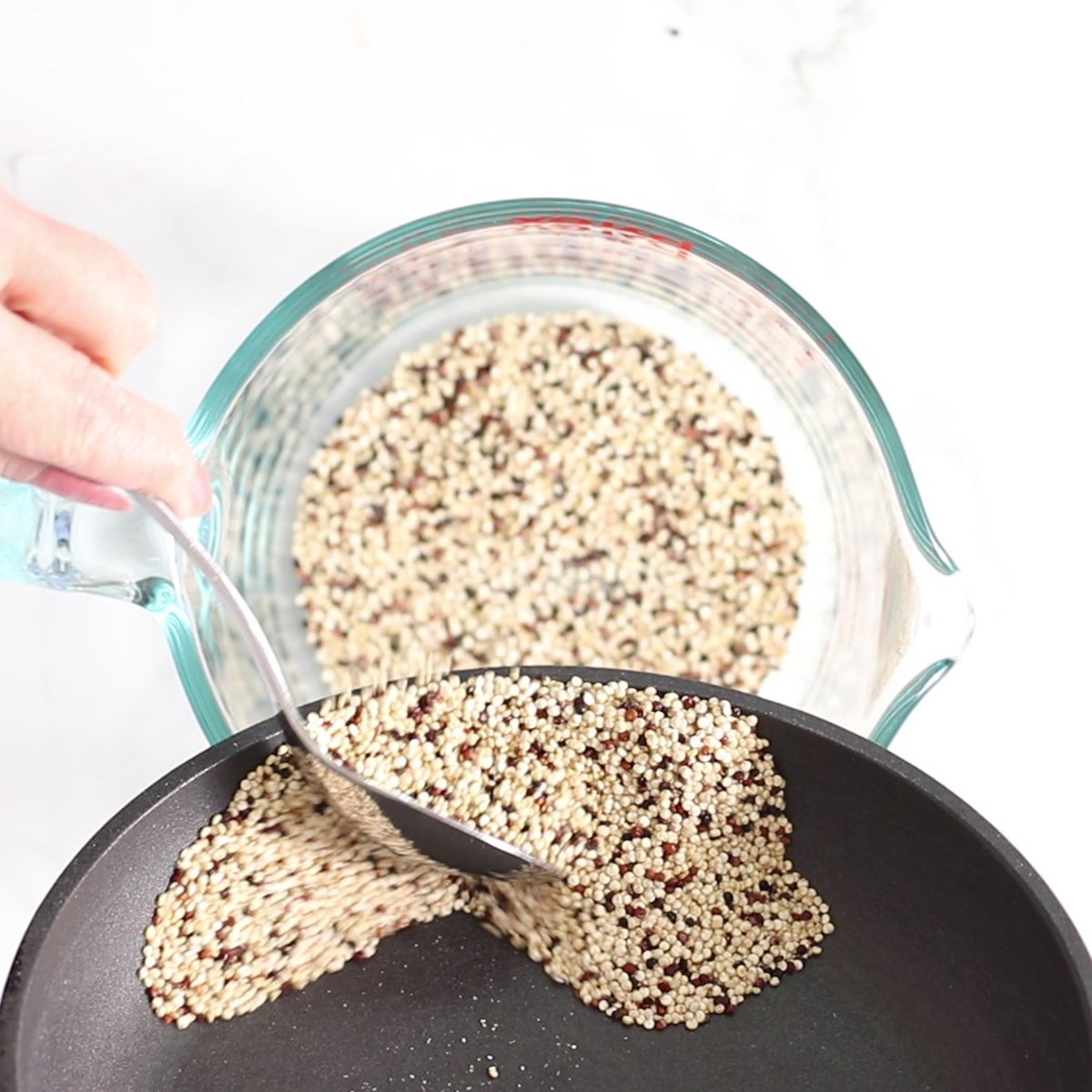 pour quinoa into a bowl.