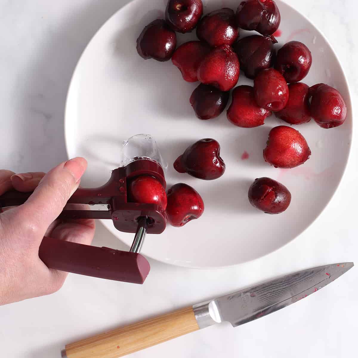 cherries being pitted