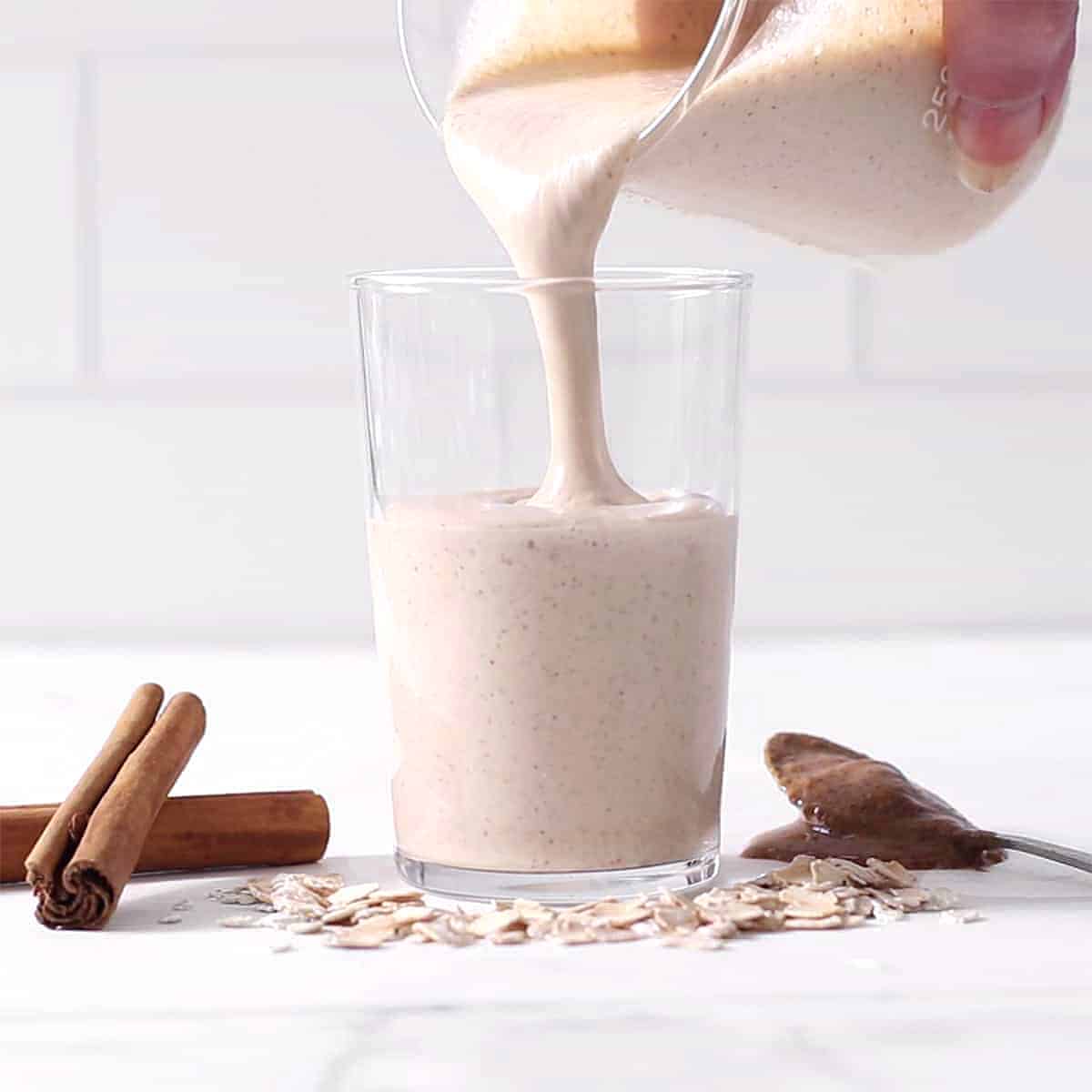 pouring oatmeal smoothie