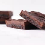 two protein bars stacked and leaning
