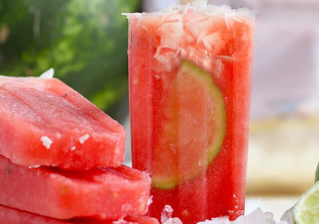 watermelon popsicles propped in ice