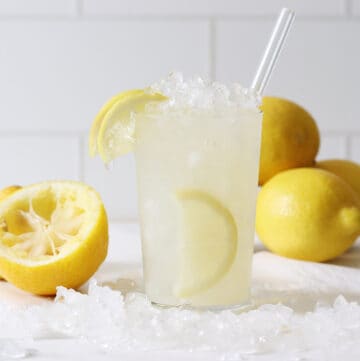 lemon rinds in a glass of lemonade